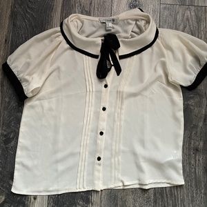 Collared white and black blouse